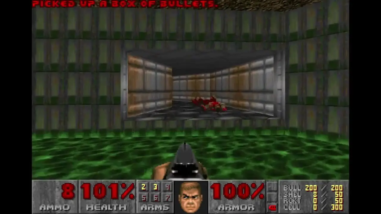 In this first-person perspective screenshot from DoomSol, the player character holds a pistol while standing in green slime and looking toward an alcove containing defeated red enemies beneath a notification that reads 'PICKED UP A BOX OF BULLETS'.