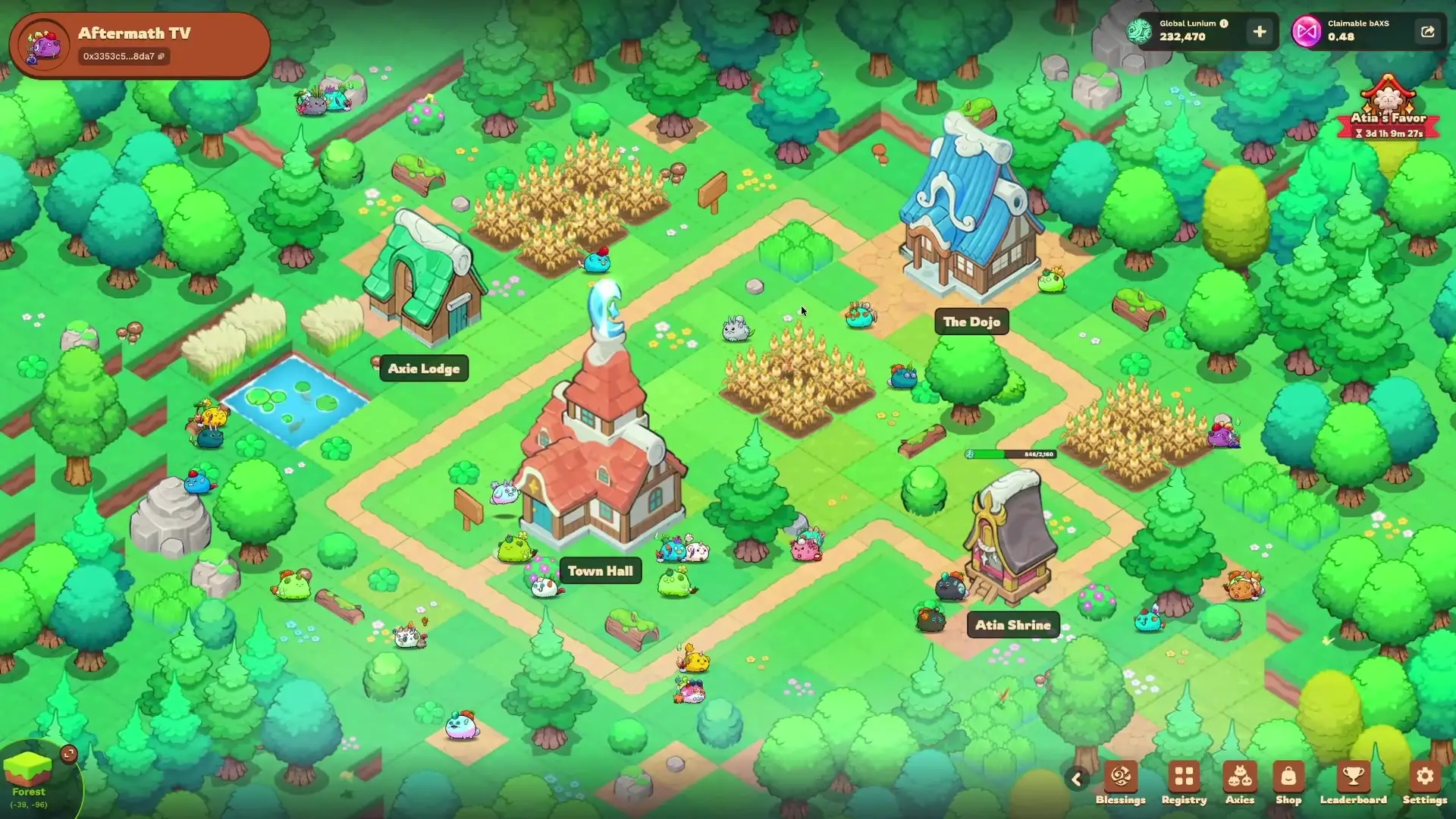 In this screenshot from Axie Infinity: Terrariums, numerous small creatures roam across a green landscape featuring several labeled buildings including the Town Hall, The Dojo, and Atia Shrine amidst patches of crops and trees.