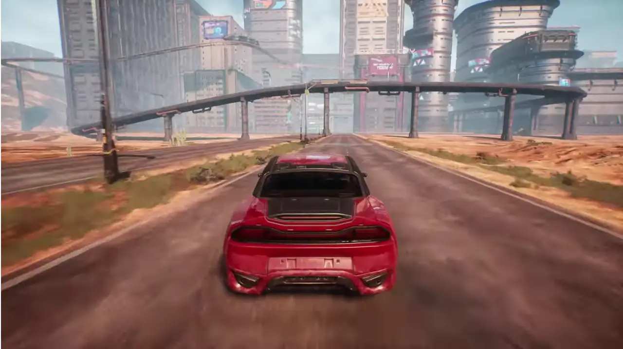 In the game Artyfact, a red car is driving down a road surrounded by a futuristic cityscape with towering buildings and elevated structures.