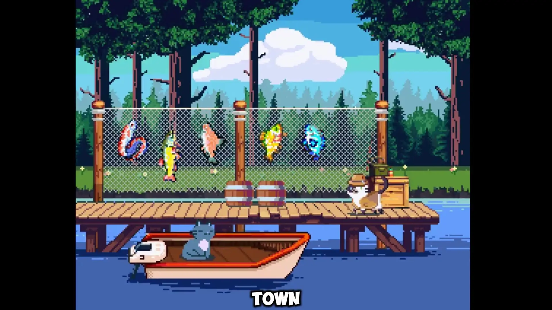 In the game Cat Town, a cat wearing a hat sits on a wooden dock next to fishing supplies while another cat is in a boat on the water, with a forest and a fence displaying colorful fish in the background.