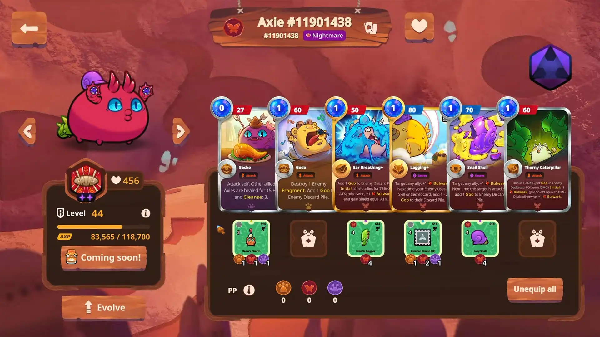 The image from Axie Infinity shows a colorful, round creature with blue eyes and horns on a red background, next to a series of cards detailing various abilities and stats including level and experience points.